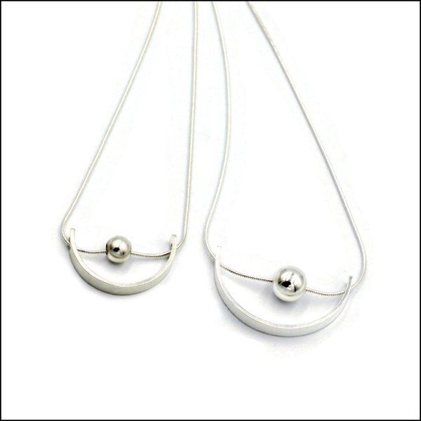 crescent with bead pendant