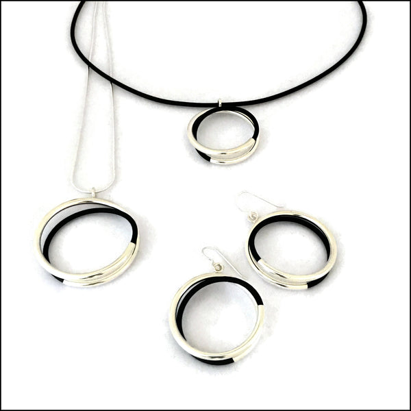 spiral tube circles sterling silver & black rubber pendants with sterling snake chain